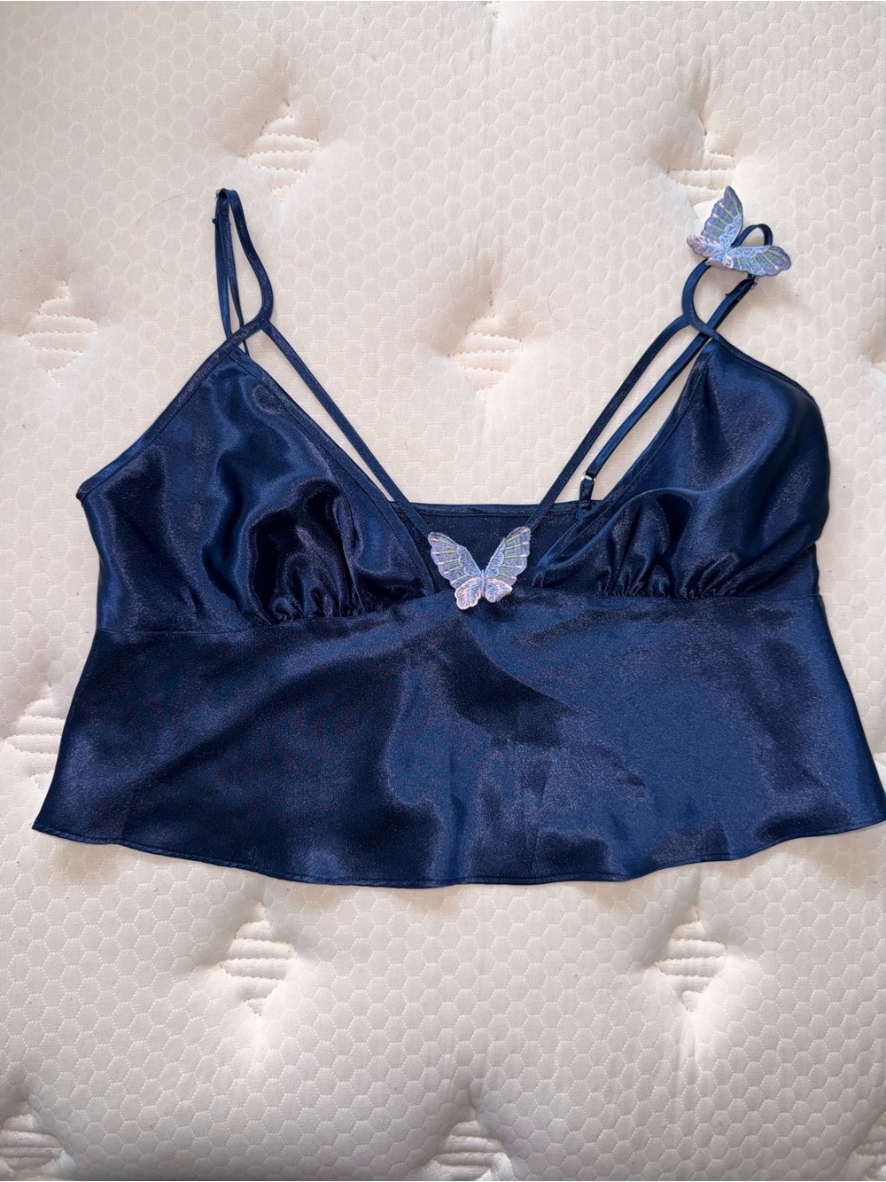107. Navy blue polyester satin cami top with silver butterfly embellishments M